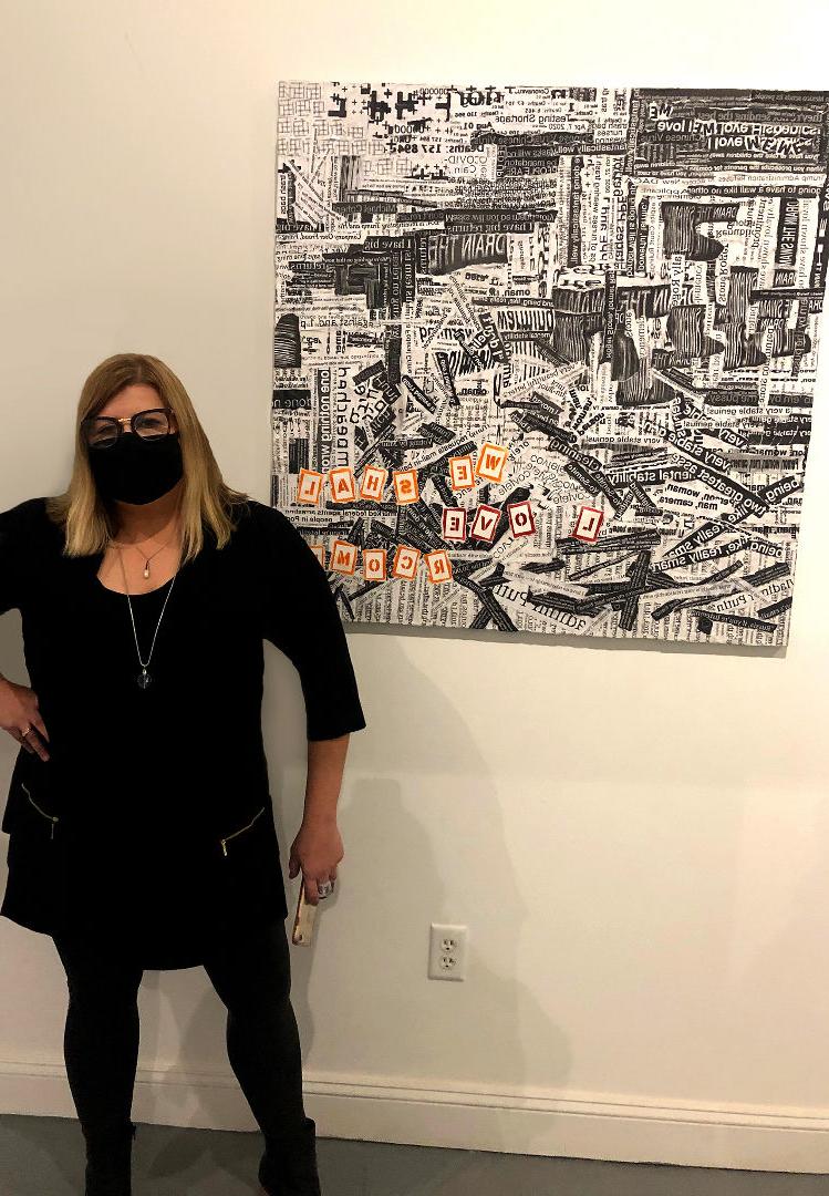 Christina Galbiati stands near her artwork