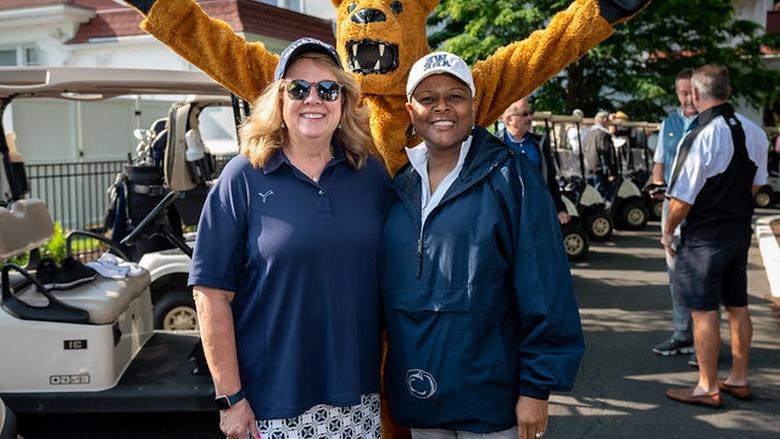 two women with Nittany Lion