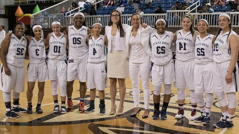 PSU-LV women's basketball team and coachs on court